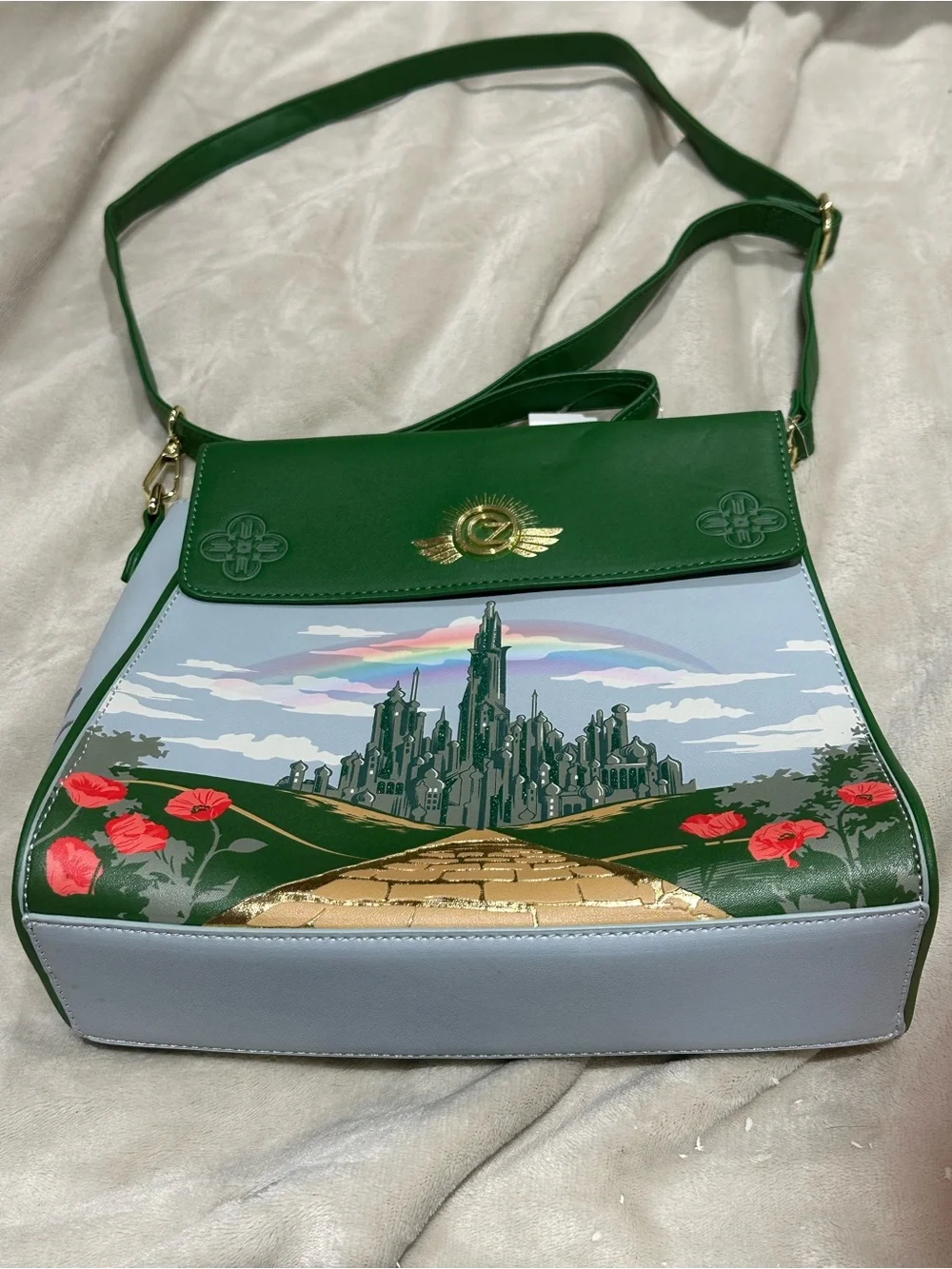 Green Illustrated Crossbody Bag with Gold Emblem